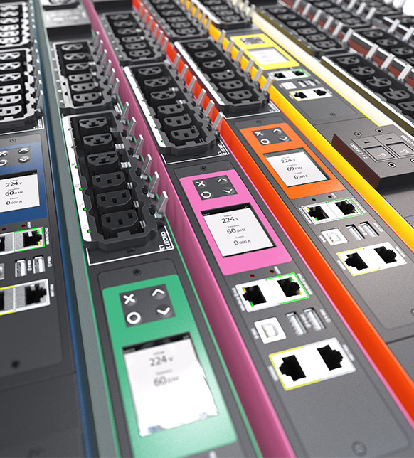 Close up image of four raritan rack PDUs in colors red, green, orange, and yellow