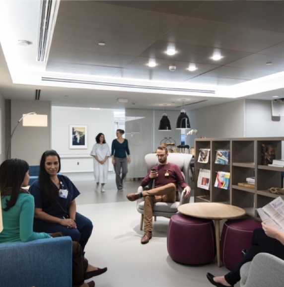 Medical staff and patients in a hospital waiting room