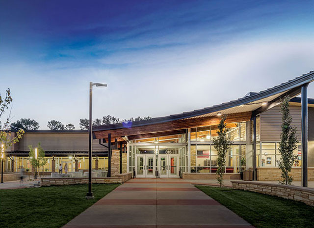 The external of a high school building with Kenall lighting fixtures