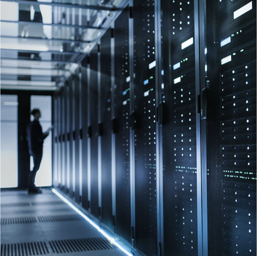 Person standing in front of a data center