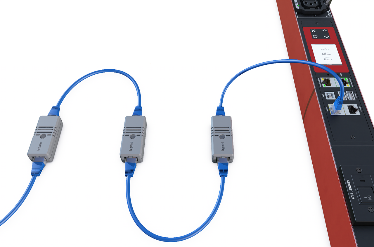 Three T1H1 temperature and humidity sensors connected in a chain of RJ25 cables to a raritan PX4 rack pdu